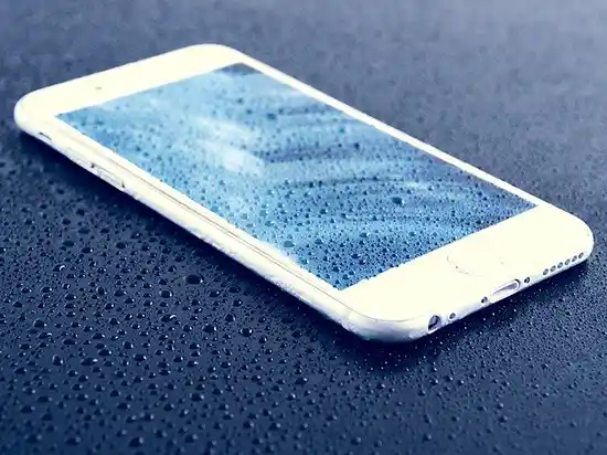 wet smartphone on wet surface
