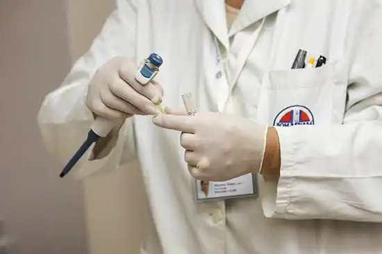 medic with testing kit