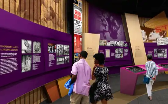 People reading information panels at National Museum of African American Music Nashville