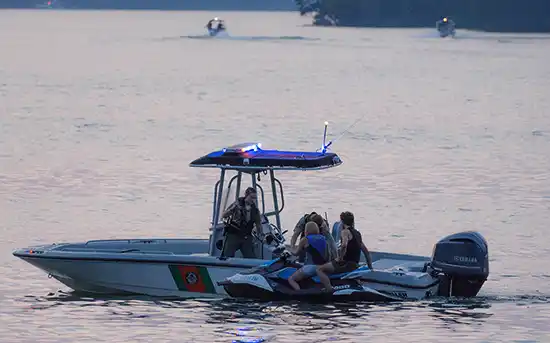 TWRA Boating Officers helping people on jet ski