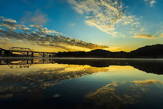 The sun rises over the Tennessee River